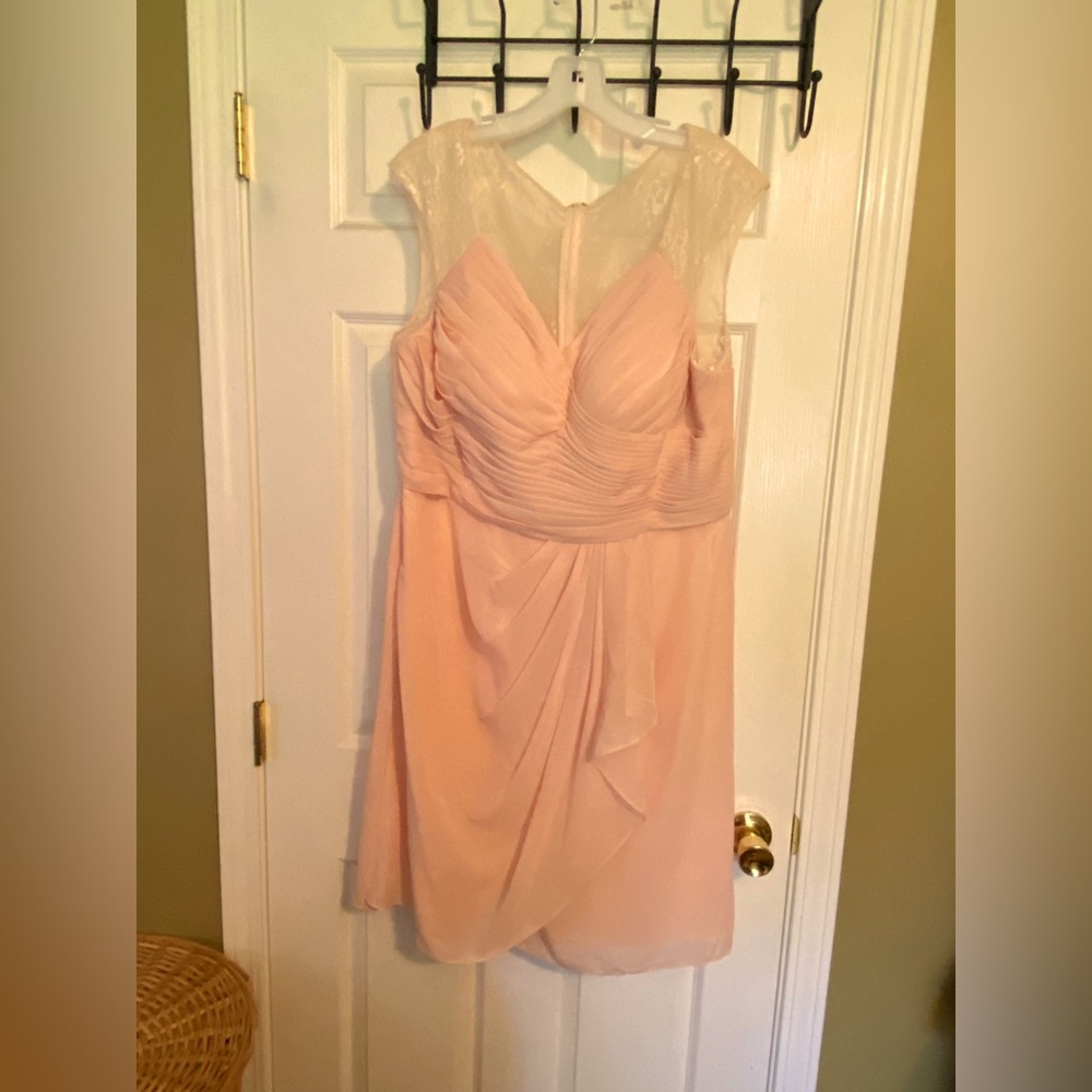 Pale pink, knee length bridesmaid dress